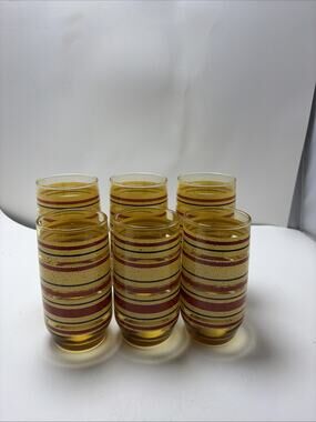 Mid Century Modern amber glass juice tumblers yellow red stripe speckled Anchor
